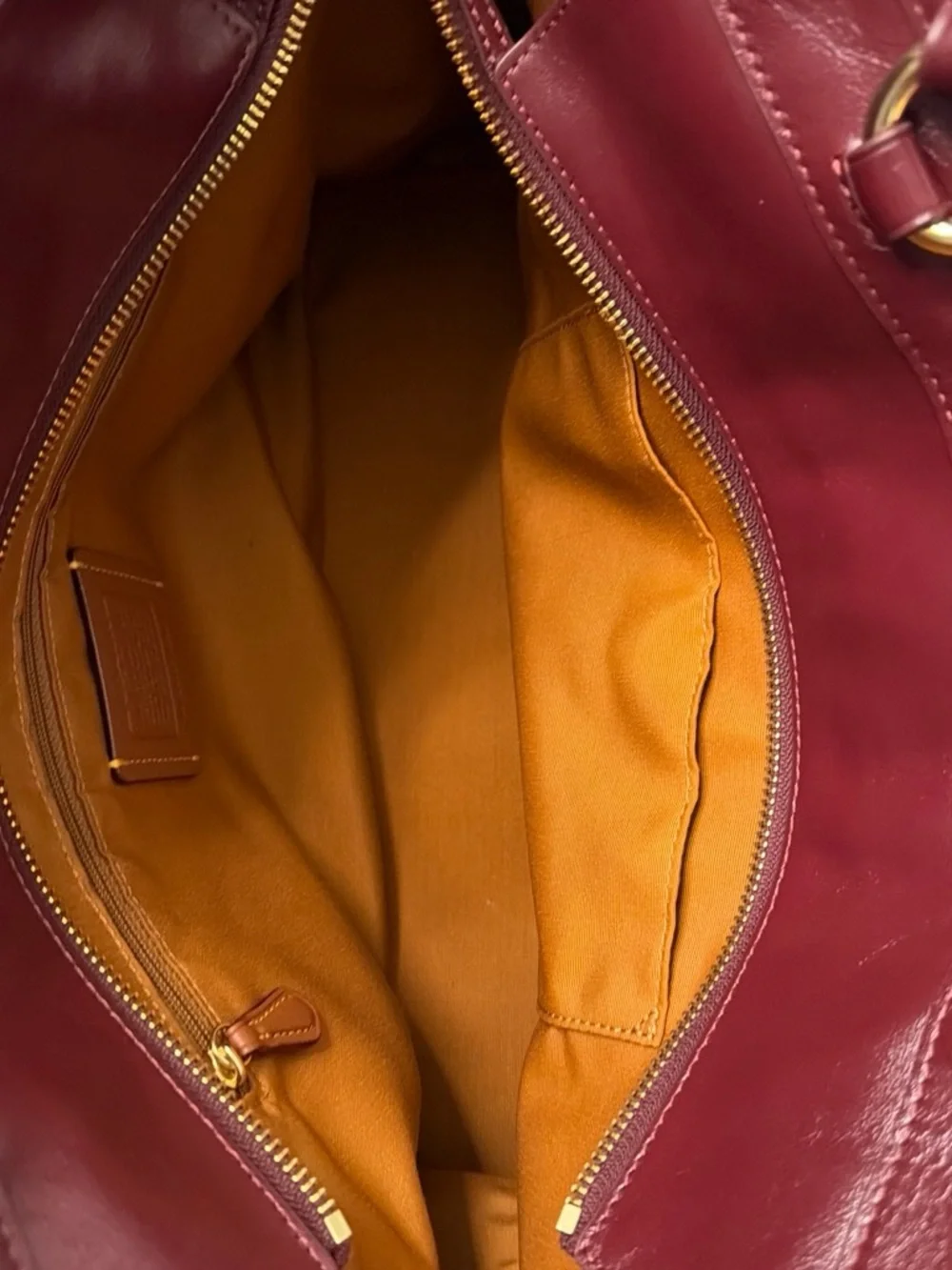 Coach Easton Wine Leather Tote with Gold Accents